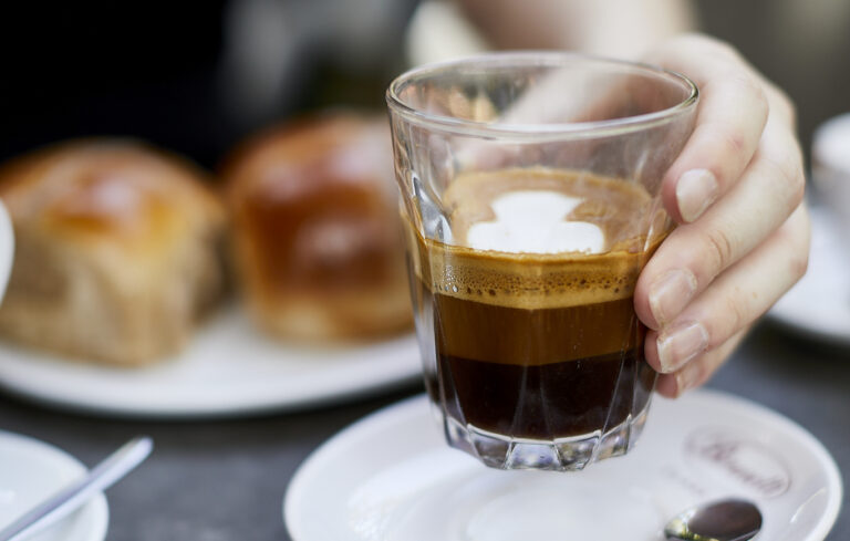 hand holding Brunetti Classico coffee